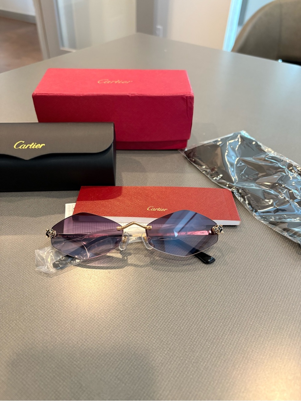 Cartier Women's Rimless Sunglasses - Gray Gradient Lenses with Gold Accents